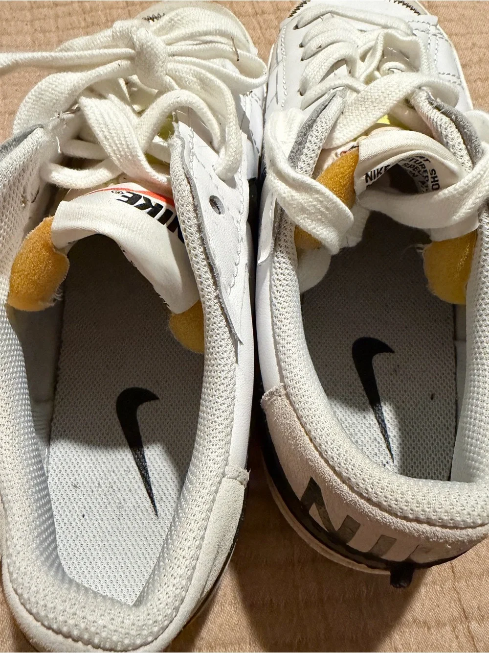 Nike Kids White Sneakers with Black Swoosh